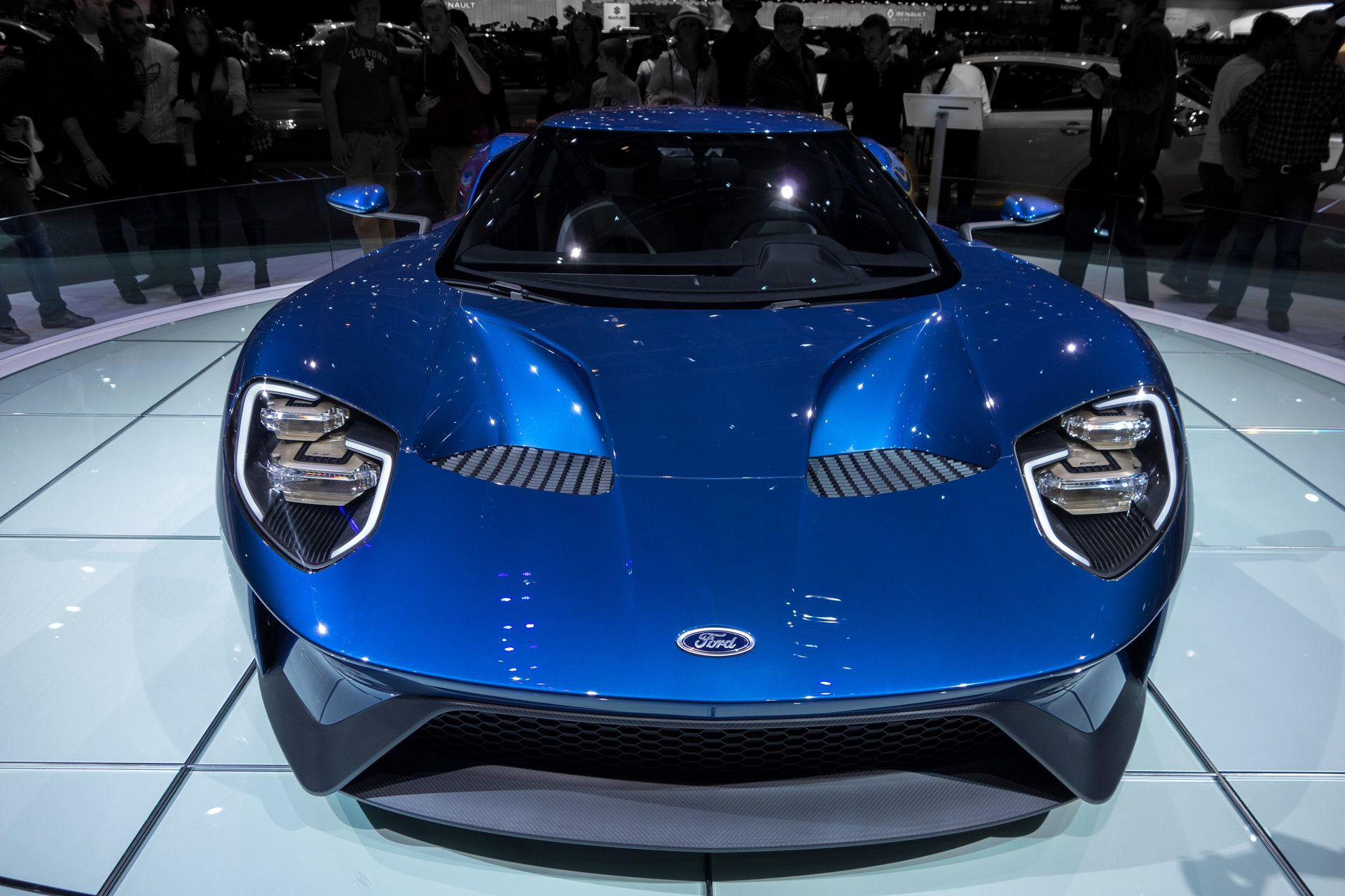 Ford GT in Liquid Blue on an illuminated display turntable