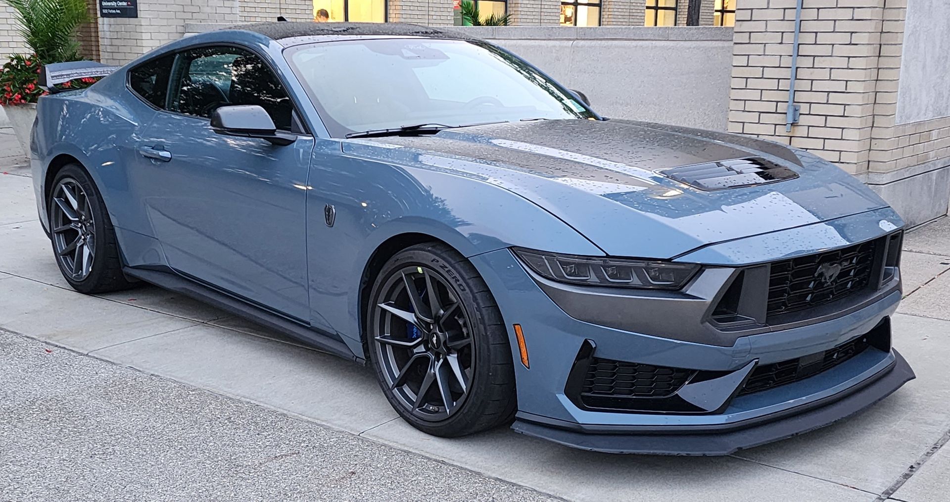 Ford Mustang Dark Horse in blue-grey, front three-quarter view